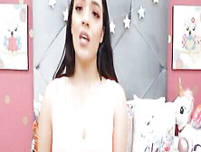 Solo girl with a pretty face is about to masturbate using a big dildo