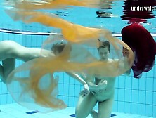 Two Hotties Submerged Underwater