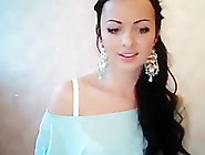 Pretty brunette Bounty20 undresses and gently stroking her body