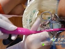 Beautiful Female Surgeon With Surgical Gloves Fisting