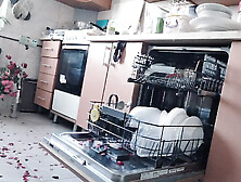 Sexy naked woman preparing food in the kitchen.  Hairy brown hair,  big ass,  big.