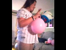 Charming Lady Having Fun Popping Balloons In Her Panties
