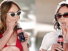 Two cute babes,  Eve Sweet and Lilly Bell,  have fun on the bed.