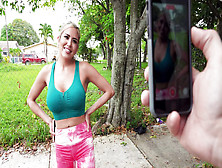 Caitlin Bell is getting picked up outdoors