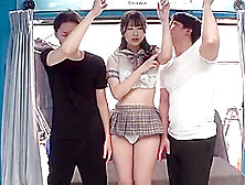 She is touched by two men,  fingered intensely,  squirts,  and is penetrated deep in the throat.