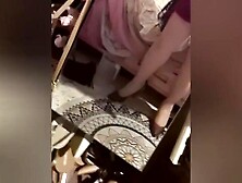 Dude wearing hose and red heels