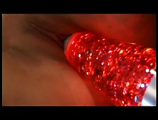 Horny broad rides a sex toy with her anus in porn video