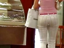 A seductive chick filmed in a voyeur street candid video