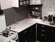 My naked girlfriend making dinner in the kitchen