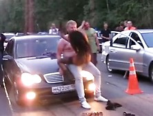 The mad stripper angel in Russian Federation on the car race show