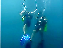 Scuba Blonde Sucks Two Dicks