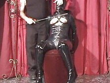 gal tied in spandex rubber hooded gagged played by tormentor