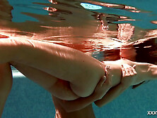 Olla Oglaebina and Stefanie Moon sexy nude girls in the pool