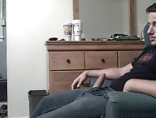 Hot ponytailed brunette sucks her bf's cock on a chair