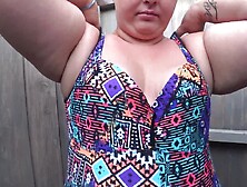 A Chubby Girl With A Fat Butt On A Public Beach Changes Clothes In A Swimsuit.