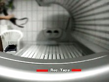 catches hot babe rubbing her pussy at the tanning saloon