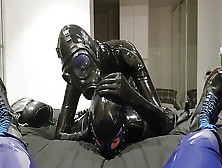 Two Super-Naughty Latex Marionettes Ravaging One Another