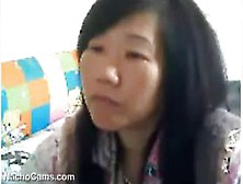 Mature Chinese Woman Shows Off Breasts