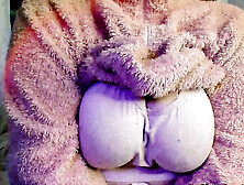 a meaty woman in a fluffy suit shows her body