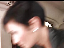 Brunette milf rammed in the back of a moving car