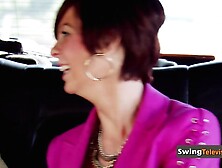 Swing couple meets up with the hostess before heading out to have fun