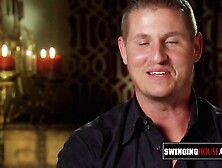 Married swinger couple warms up in a sexual encounter. Amateur reality television swing show.