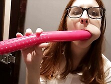 Lady With Glasses Plays With A Dildo.