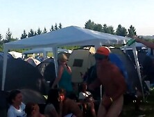 Guy streaking at festival