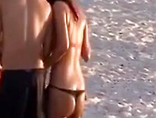 A Hot Chick in a Thong on the Beach