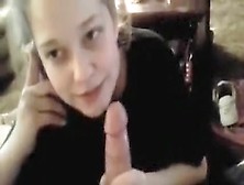 Blonde Talks on the Phone While Sucking Cock