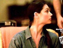 Girl smothered with a pillow in a sofá