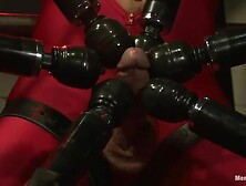 Muscled gay man in a superstar costume gets stimulated