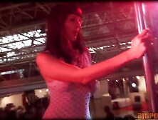 A pair of hot strippers is performing a seductive...