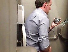 Stranger Man In A Public Toilet Filmed On A Hidden Camera