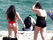 Chubby babes have fun on the public beach