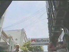 Brunette hussy gives an up skirt view of her naked butt