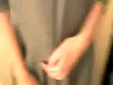 Lesbians in changing room with strap on