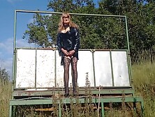 Crossdresser Playing Down On The Farm In Pvc