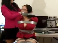 sexy women wrap gagged in the chair by Gina Rae Michaels