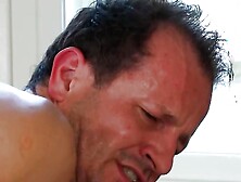 A busty German MILF with blonde hair gets destroyed by two dudes