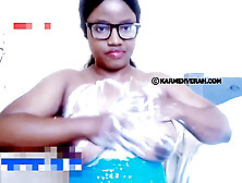 Black girl smearing ice cream on her big natural boobs