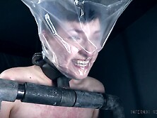 BDSM torture for short haired brunette Kitty Dorian tied to the floor