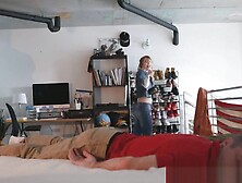 Anastasia rub his crotch through his pants