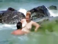 Couple Having Sex At The Sea