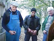 Dark Brown in nylons sucks leather chap's knob outdoors