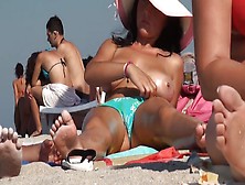 Busty Milf On The Beach