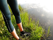 Swimming In The Lake In Sport Wear At Sunset..  Wet Leggings And