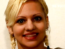 Blonde milf with her legs held 180 degrees to screw her pussy with the sex toy