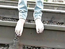 Very Dirty Feet Walking On Railing