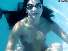 Jacqueline Hope liking being nude into the pool